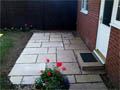 Small Indian stone patio with step